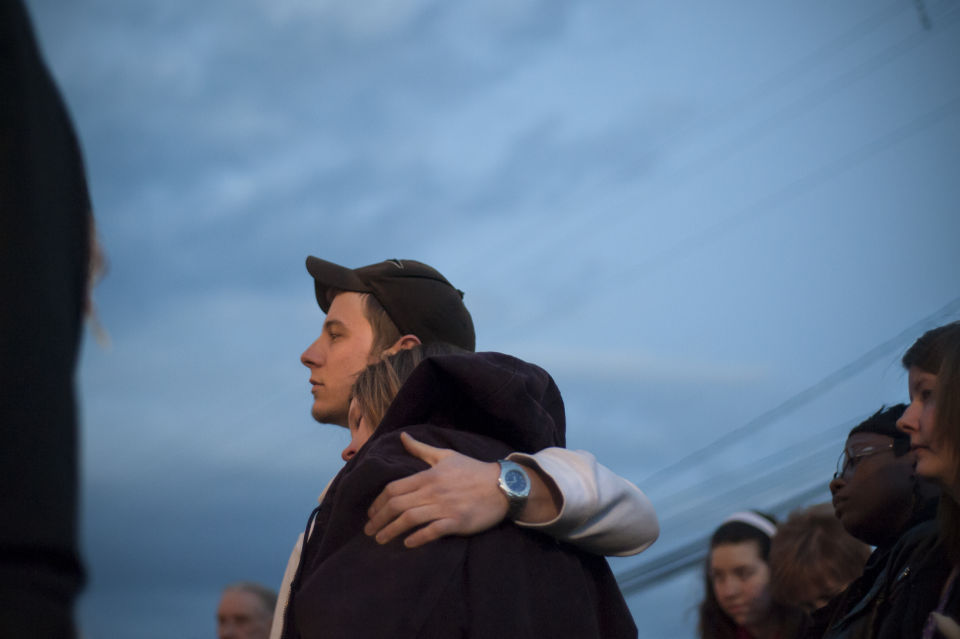 Candlelight vigil remembers eight killed in 2010 slaying